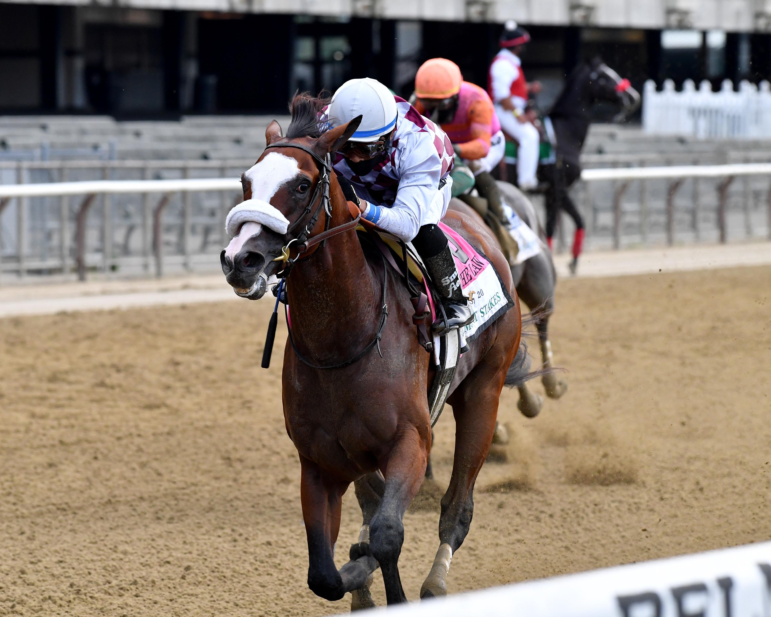 Tiz the Law streaks to victory in the Belmont.